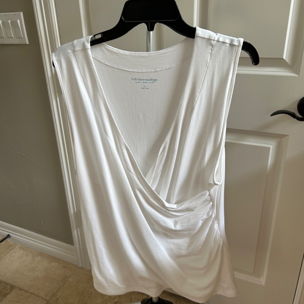 Soft Surroundings white sleeveless wrap top.